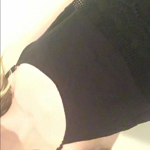 Black Romper w Lace Fringe wrapping around torso.